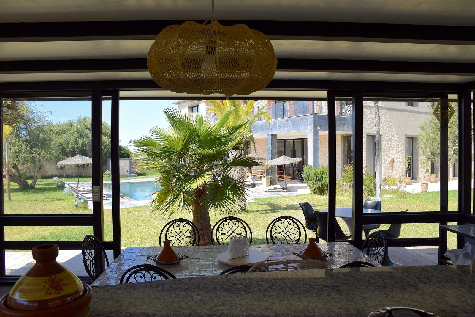 Véranda de la villa Octagon avec vue sur la piscine